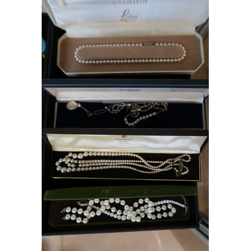 27 - A Quantity of Costume Jewellery to include Watches, Silver Charms, Rings and assorted&nbsp;
