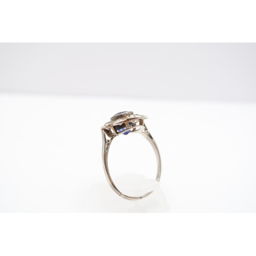  A 18ct White Gold Sapphire & Diamond Cluster Ring, Central Deep Blue Oval Sapphire Approx. 2ct W... 