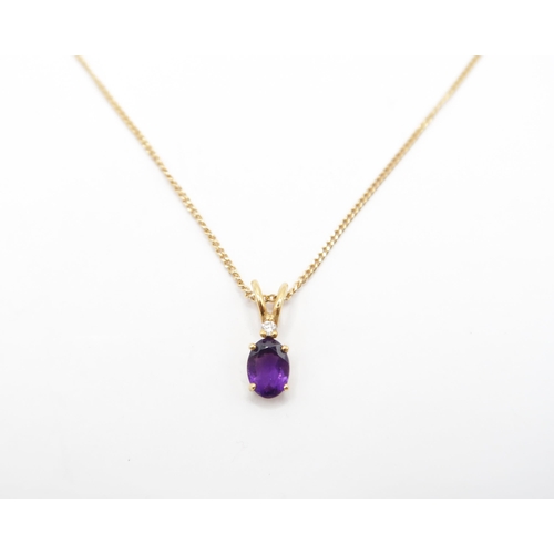  An 18ct Four Flaw Amethyst Pendant, Bale set with small diamond.&nbsp;Weight: 4g Length: 50cm&nbsp;... 