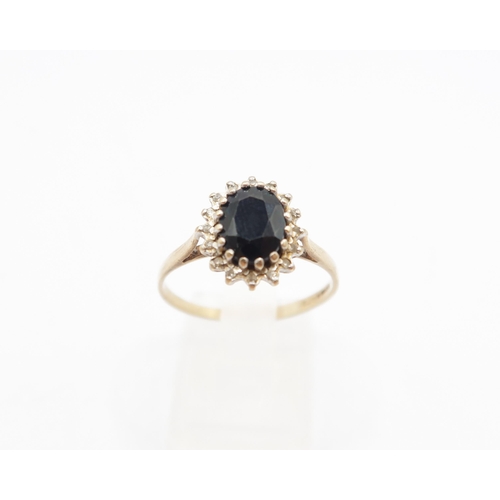  A 9ct Dark Sapphire Ring&nbsp;Weight: 2g Size: R