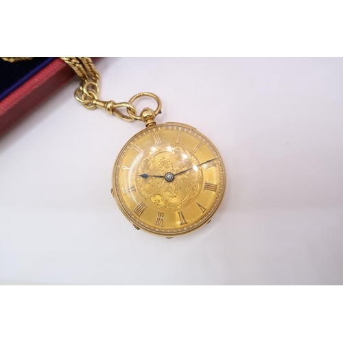  An Early 19th Century 18ct, Open Faced Pocket watch featuring a finely engraved dial with foliate sc... 