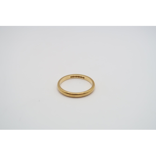  A 22ct gold band ring. Size L 1/2. Weight 2.33 grams