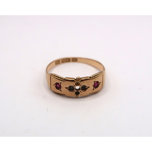  A 15ct gold ring set with two rubies, come stones missing. Size O. Weight 2.34 grams