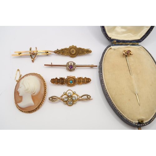  A cased pink stone stick pin. Weight 2 gram. Together with a group of six brooches. Two test as 15ct... 