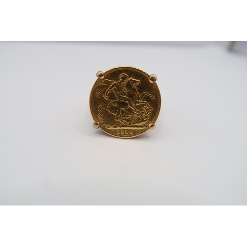  A Queen Victoria 1899 full sovereign mounted in a ring, tests 9ct. Size T. Weight 15.27 grams