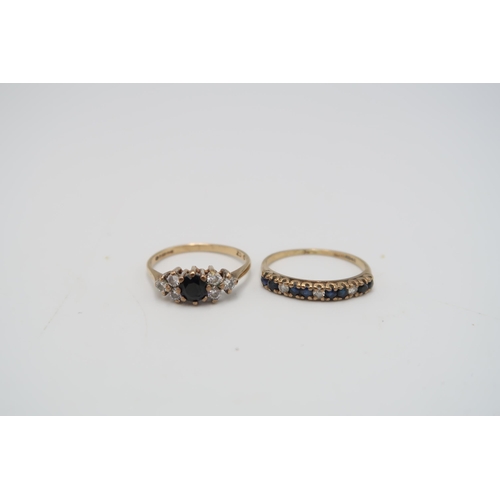  A 9ct gold sapphire and diamond eternity ring. Size L 1/2. Weight 1.22 grams. A 9ct gold sapphire an... 