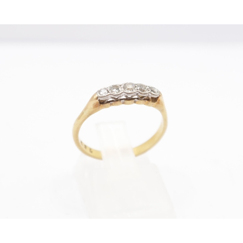 56 - An 18ct Five Stone Diamond Ring&nbsp;Weight: 2.35g Size: M 1/2
