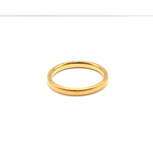 71 - A 22ct band ring. Size M 1/2. Weight 3.34 grams