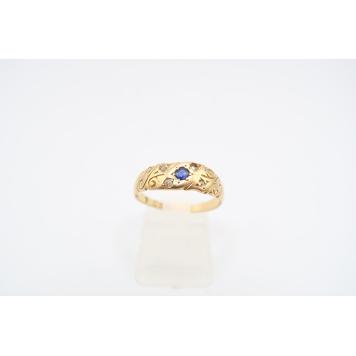  A Worn 18ct Sapphire and White Stone Ring&nbsp;Weight: 2.71g Size: O