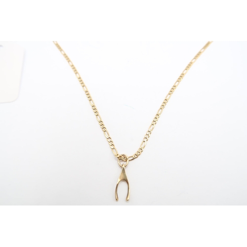  A 9ct Figaro Chain with Wish Bone Pendant&nbsp;Weight: 4g Length: 44cm