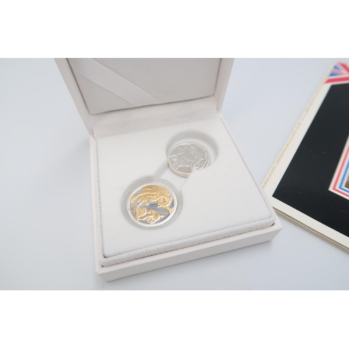  A Group of Coins to include Two 'Silver' Sovereigns, George 1916 Three Pence and a 1983 UK Uncircula... 