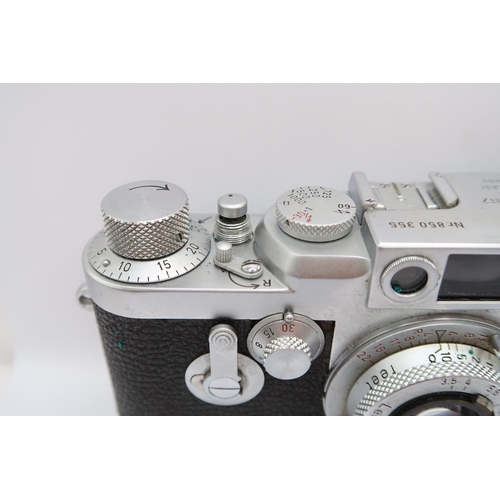  A 1950's Leica DBP Camera, (No 850 355), with Leitz Elmar&nbsp; F=3.5cm 1:3.5 lens, In Leather Case&... 