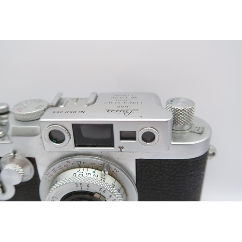  A 1950's Leica DBP Camera, (No 850 355), with Leitz Elmar&nbsp; F=3.5cm 1:3.5 lens, In Leather Case&... 