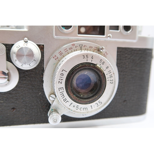  A 1950's Leica DBP Camera, (No 850 355), with Leitz Elmar&nbsp; F=3.5cm 1:3.5 lens, In Leather Case&... 