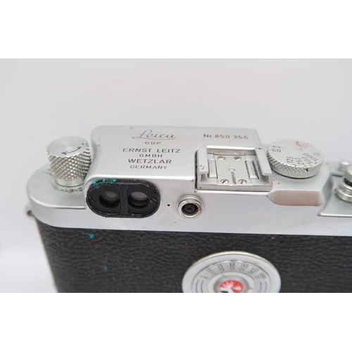  A 1950's Leica DBP Camera, (No 850 355), with Leitz Elmar&nbsp; F=3.5cm 1:3.5 lens, In Leather Case&... 