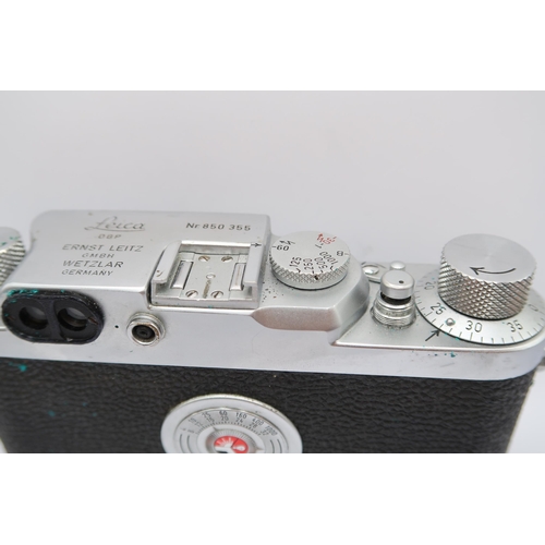  A 1950's Leica DBP Camera, (No 850 355), with Leitz Elmar&nbsp; F=3.5cm 1:3.5 lens, In Leather Case&... 