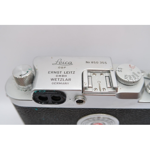  A 1950's Leica DBP Camera, (No 850 355), with Leitz Elmar&nbsp; F=3.5cm 1:3.5 lens, In Leather Case&... 