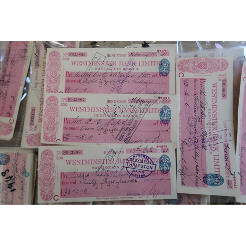 360 - A Large Group of War Time Issued Westminster Bank Limited, Huntingdon Branch Red on white Cheques. M... 