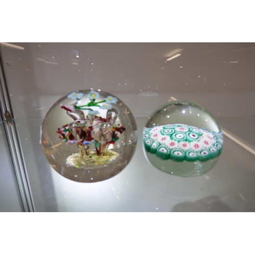 413 - A Pair of Glass Paper Weights, One approx. 90mm Diameter x 77mm High, the Other approx. 76mm Diamete... 