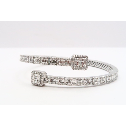133 - A Stunning Designer White Gold Diamond Bangle Fully Hallmarked to the Inside, Approx. 6.25crts of Di... 