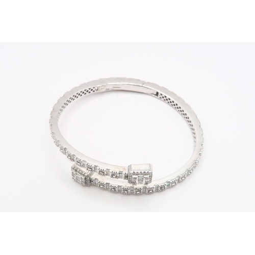 133 - A Stunning Designer White Gold Diamond Bangle Fully Hallmarked to the Inside, Approx. 6.25crts of Di... 