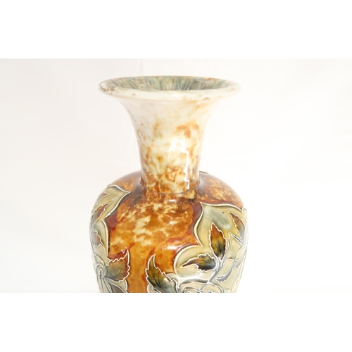 415 - A Doulton Lambeth, Art Nouveau vase, decorated floral design with bulbous body and pinched neck - br... 