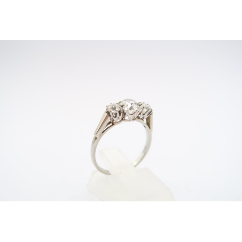 5 - An 18ct & Platinum Old Cut Diamond Three Stone Ring, Central .70ct VS2, G/H Centre Stone Flanked... 