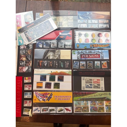 375 - Three Wessex Knight stamp albums and a Royal Mail Stamp album to include mainly British stamps, with... 