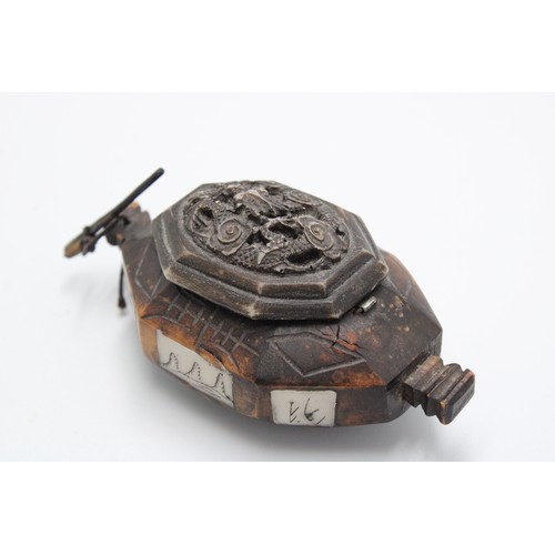 402 - A 19th Century Hand Carved Chinese Snuff Box with hand carved wooden latch. 10cm x 5cm.