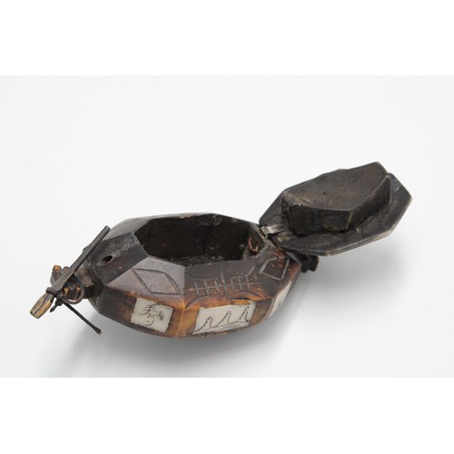 402 - A 19th Century Hand Carved Chinese Snuff Box with hand carved wooden latch. 10cm x 5cm.