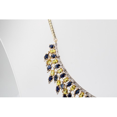 33 - A 9ct gold sapphire and diamond articulated graduated fringe centre piece necklace. Weight 41.49 gra... 