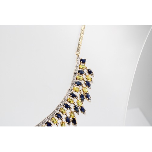 33 - A 9ct gold sapphire and diamond articulated graduated fringe centre piece necklace. Weight 41.49 gra... 