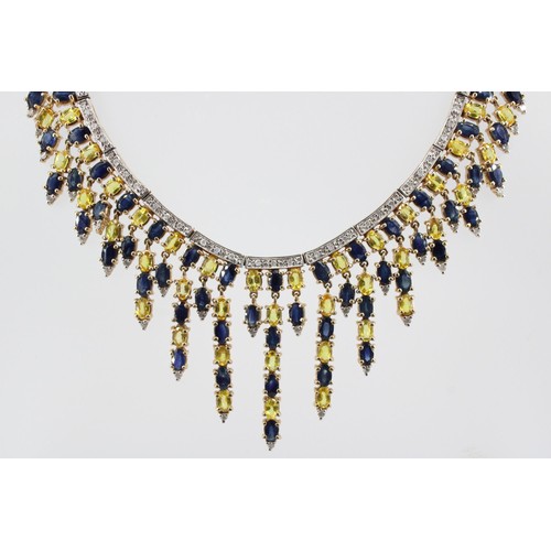 33 - A 9ct gold sapphire and diamond articulated graduated fringe centre piece necklace. Weight 41.49 gra... 