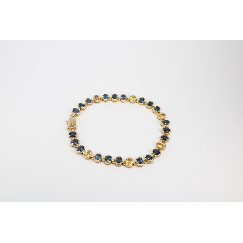 34 - A 9ct gold sapphire and diamond articulated panel bracelet. Weight 7.25 grams