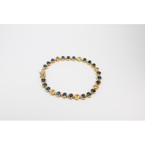 35 - A 9ct gold sapphire panel bracelet. Weight 15.83 grams