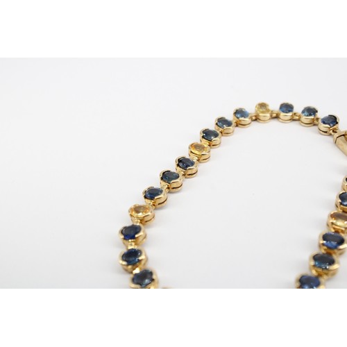 35 - A 9ct gold sapphire panel bracelet. Weight 15.83 grams