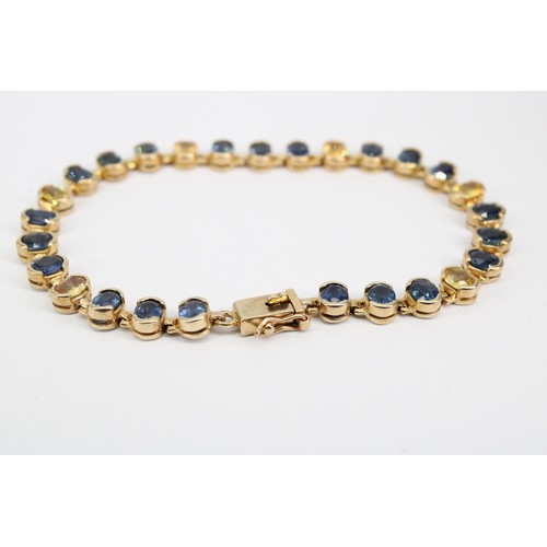 35 - A 9ct gold sapphire panel bracelet. Weight 15.83 grams