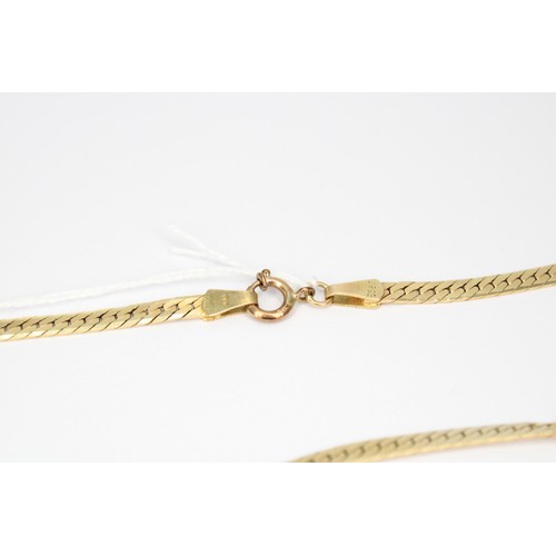 42 - A snake link chain. Stamped 14K. Weight 13.24 grams. With Kinks, 49cm.