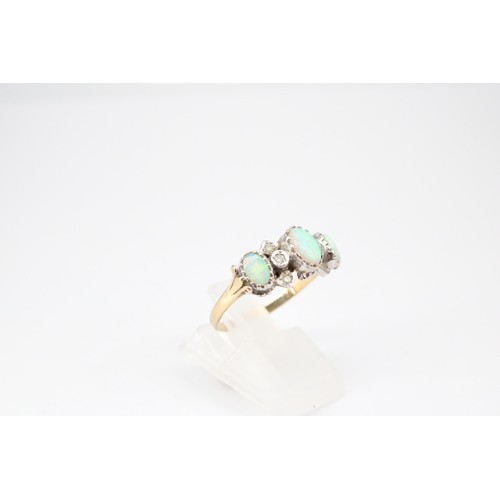 60 - A 9ct gold opal and diamond dress ring. Size P1/2. Weight 2.72 grams