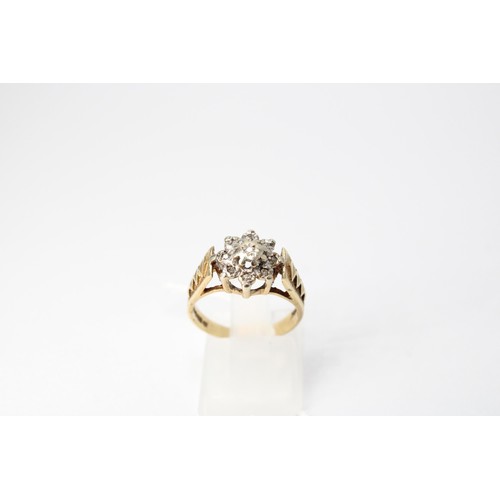 57 - A 9ct gold diamond cluster ring. Size M. Weight 3.66 grams