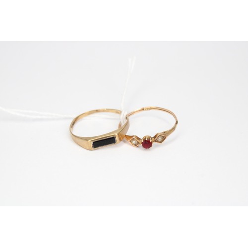 58 - A red gem and seed pearl three stone ring. Stamped 18. Size O &frac12;. Weight 0.61 gram. Together w... 