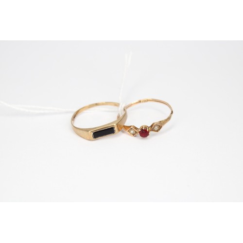 58 - A red gem and seed pearl three stone ring. Stamped 18. Size O &frac12;. Weight 0.61 gram. Together w... 