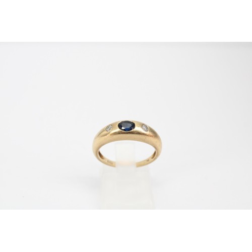 70 - A sapphire and diamond band ring stamped 9K. Size O. Weight 2.53 grams