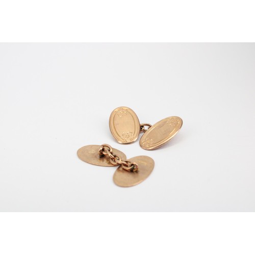 74 - A pair of 9ct gold oval panel link cufflinks. Weight 6.43 grams