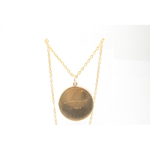 77 - A 10ct Round Locket on a 9ct oval link trace chain.&nbsp;Weight: 25.14g Length: 120cm&nbsp; (undone)... 