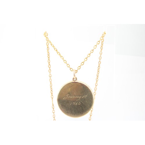 77 - A 10ct Round Locket on a 9ct oval link trace chain.&nbsp;Weight: 25.14g Length: 120cm&nbsp; (undone)... 