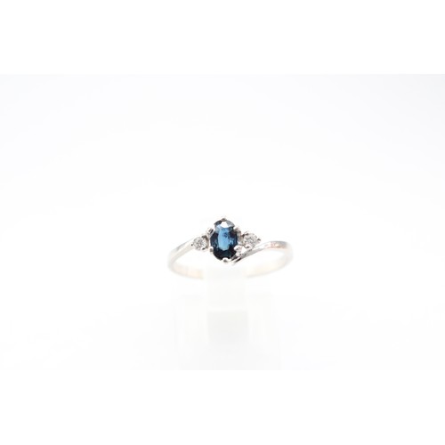 79 - A Platinum Blue & White Stone Ring, with Bypass Head Design. Believed to be Sapphires.&nbsp;Weig... 