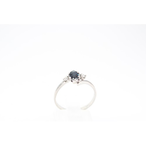 79 - A Platinum Blue & White Stone Ring, with Bypass Head Design. Believed to be Sapphires.&nbsp;Weig... 