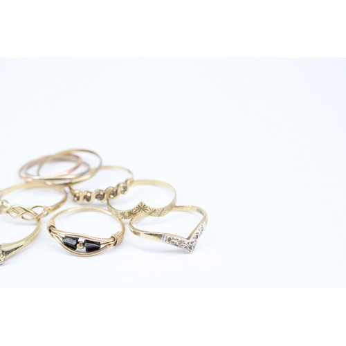 86 - A Group of 9ct Assorted Rings Together with One 14ct Tested ringWeight: 7.93g