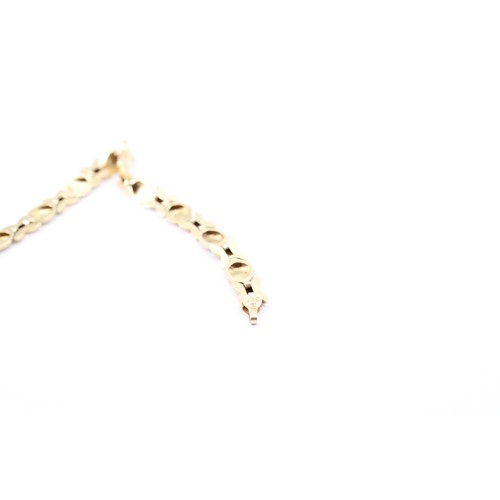 16 - A 14ct T&C Stamped 'Hugs and Kisses' Links Bracelet&nbsp;Weight: 5g Length: 18cm&nbsp;... 